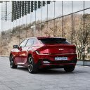 Red Kia EV6 by Windows of Modern Building  screen for extension Chrome web store in OffiDocs Chromium