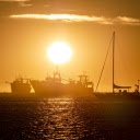 Red sun above the boat  screen for extension Chrome web store in OffiDocs Chromium