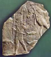 Free download Relief depicting a cavalryman leading his horse beside a stream free photo or picture to be edited with GIMP online image editor