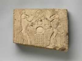 Free download Relief panel showing two baboons offering the wedjat eye to the sun god Khepri free photo or picture to be edited with GIMP online image editor
