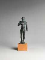Free download Reproduction of a bronze votive statuette of a man free photo or picture to be edited with GIMP online image editor