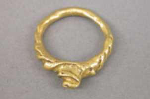 Free download Ring with Stylized Flame Motif and Ribbed Hoop free photo or picture to be edited with GIMP online image editor