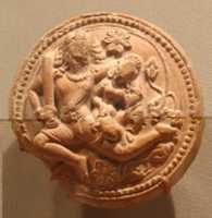 Free download Rondel with a Racing Male Deity Cradling His Consort (Probably Shiva and Parvati) free photo or picture to be edited with GIMP online image editor