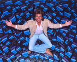 Free download Ron Roy Surrounded By His Moodtapes free photo or picture to be edited with GIMP online image editor