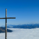 Scenic View of Swiss Alps with Mountain Cross  screen for extension Chrome web store in OffiDocs Chromium