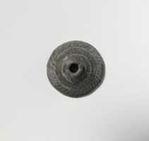 Free download Schist spindle whorl free photo or picture to be edited with GIMP online image editor