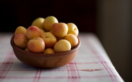 A bowl of fragrant yellow apricots  from Chrome web store to be run with OffiDocs Chromium online