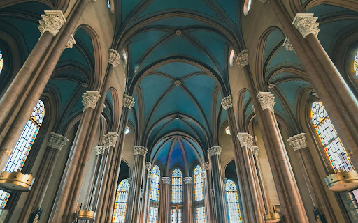 A Cathedral Interior with an Aisle Leading  from Chrome web store to be run with OffiDocs Chromium online