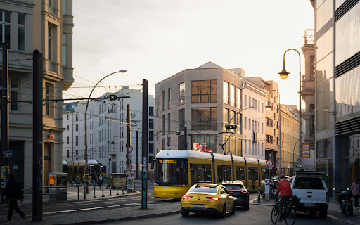 A city street with a yellow bus and cars  from Chrome web store to be run with OffiDocs Chromium online