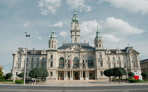 A large building with a clock tower and a clock  from Chrome web store to be run with OffiDocs Chromium online