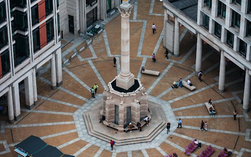 A large clock tower in the middle of a city  from Chrome web store to be run with OffiDocs Chromium online