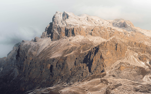 A Rocky Mountain under a Cloudy Sky  from Chrome web store to be run with OffiDocs Chromium online