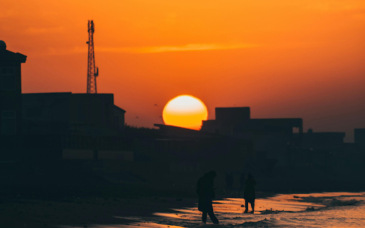 A Scenic Sunset at a Beach  from Chrome web store to be run with OffiDocs Chromium online