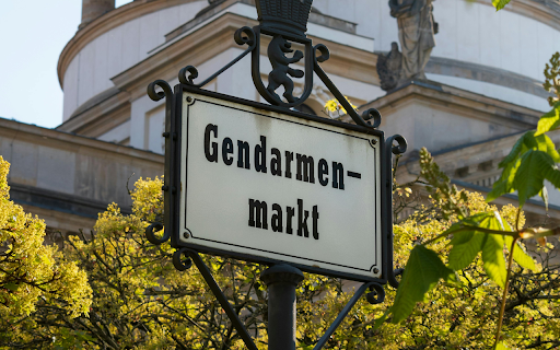 A sign that says germanys man  from Chrome web store to be run with OffiDocs Chromium online