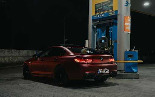 A Sports Car at a Gas Station  from Chrome web store to be run with OffiDocs Chromium online