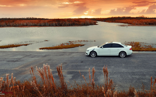 Audi Sedan at Sunset Waterside  from Chrome web store to be run with OffiDocs Chromium online Audi Sedan at Sunset Waterside  from Chrome web store to be run with OffiDocs Chromium online