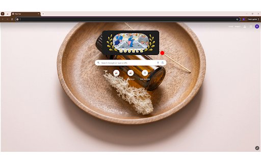 A Vial of Essential Oil on a Wooden Plate  from Chrome web store to be run with OffiDocs Chromium online