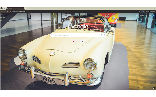 A Vintage Yellow Car in Showroom  from Chrome web store to be run with OffiDocs Chromium online