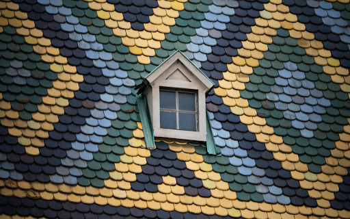 A window in a colorful tile roof  from Chrome web store to be run with OffiDocs Chromium online
