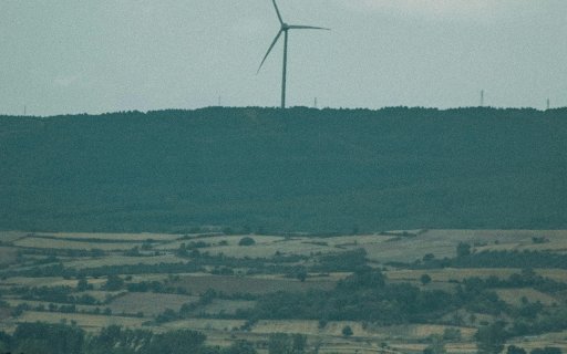 A Wind Turbine near a Rural Area  from Chrome web store to be run with OffiDocs Chromium online