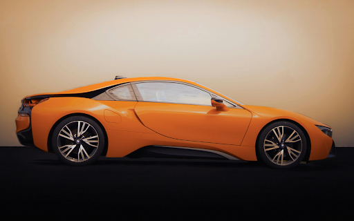 A yellow Car in Front of a Building  from Chrome web store to be run with OffiDocs Chromium online