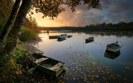 Boat docked on the river from Chrome web store to be run with OffiDocs Chromium online Boat docked on the river from Chrome web store to be run with OffiDocs Chromium online