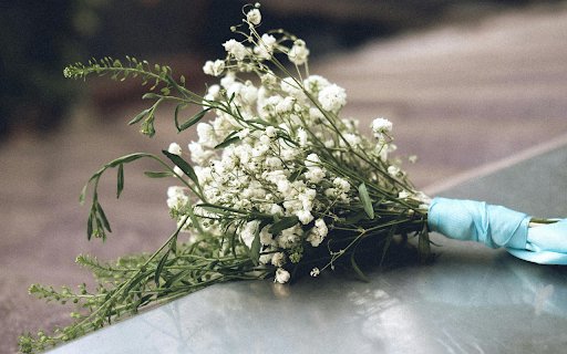 Bouquet of White Flowers on a Grave  from Chrome web store to be run with OffiDocs Chromium online