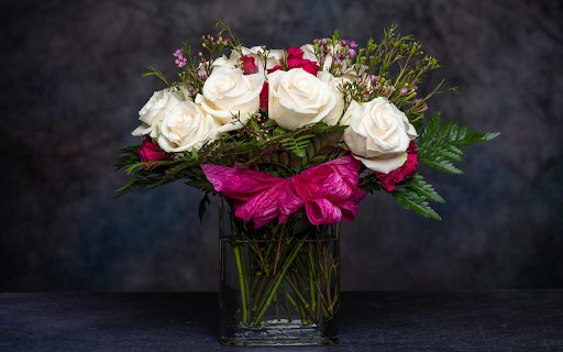 Bunch of various fresh flowers decorated with ribbon in glass vase  from Chrome web store to be run with OffiDocs Chromium online
