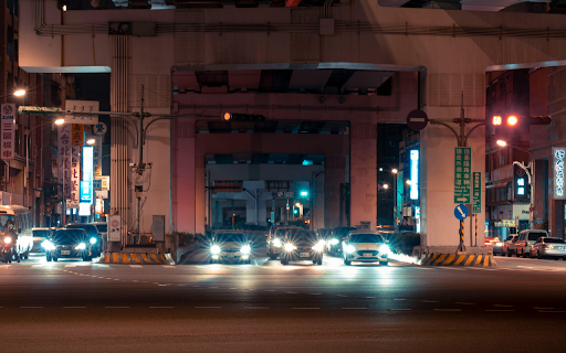 Cars at an Intersection during Night Time  from Chrome web store to be run with OffiDocs Chromium online