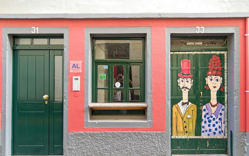 Colorful Street Art on Funchal Building Façade  from Chrome web store to be run with OffiDocs Chromium online