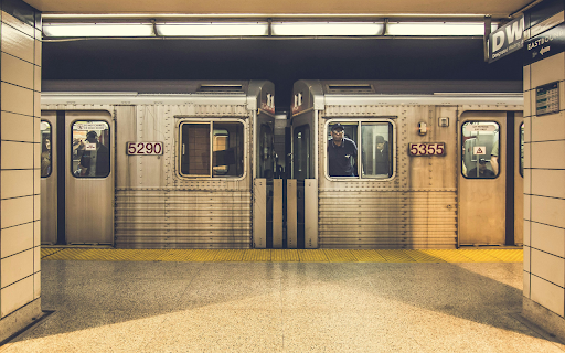 Commuters Waiting In the Gray Train  from Chrome web store to be run with OffiDocs Chromium online