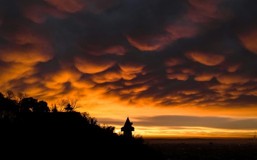 Dramatic Sunset Silhouette Over City Skyline  from Chrome web store to be run with OffiDocs Chromium online