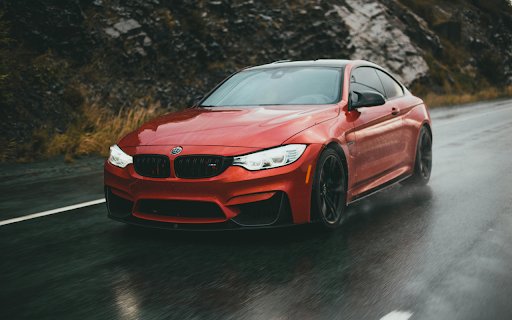 Driving a Red BMW Sportscar on the Wet Road from Chrome web store to be run with OffiDocs Chromium online Driving a Red BMW Sportscar on the Wet Road from Chrome web store to be run with OffiDocs Chromium online