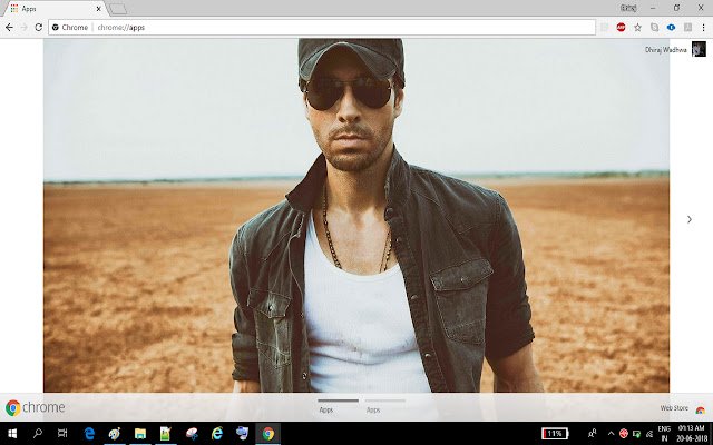 Le thème Enrique Iglesias de la boutique en ligne Chrome sera exécuté avec OffiDocs Chromium en ligne