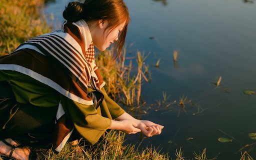 Girl releases fish  from Chrome web store to be run with OffiDocs Chromium online