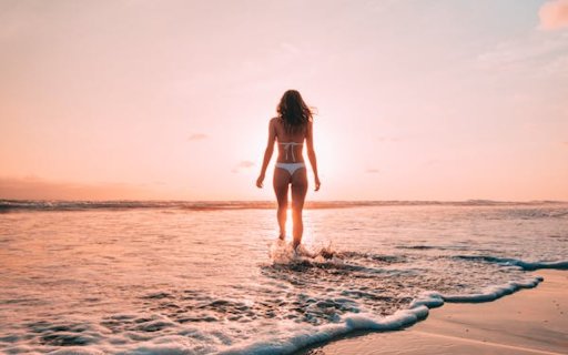 Girl walking on the beach  from Chrome web store to be run with OffiDocs Chromium online