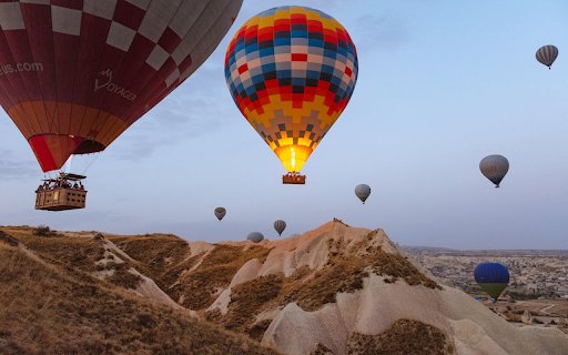 Hot air balloons floating in the sunset  from Chrome web store to be run with OffiDocs Chromium online