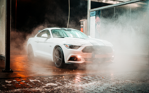 Introduction to the Ford Mustang with White Smoke on the Road  from Chrome web store to be run with OffiDocs Chromium online