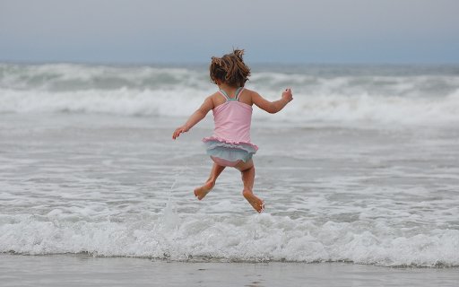 Little girl bathing in the sea  from Chrome web store to be run with OffiDocs Chromium online