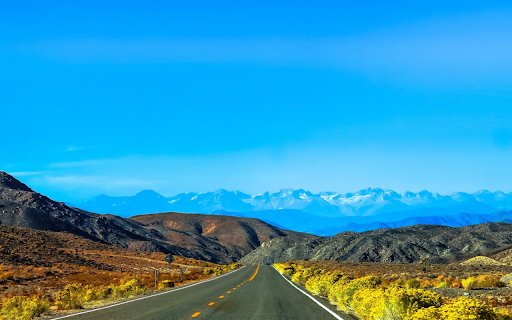Long straight road with vast mountains  from Chrome web store to be run with OffiDocs Chromium online