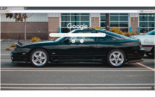 Modern black car parked on edge of road  from Chrome web store to be run with OffiDocs Chromium online
