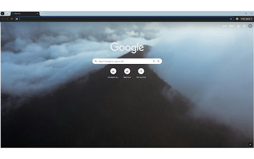 Mountain peak covered with forest in fog  from Chrome web store to be run with OffiDocs Chromium online