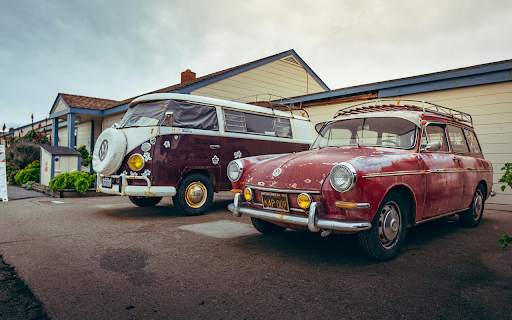 Old Volkswagen Type 2 and Type 3 cars in the Driveway  from Chrome web store to be run with OffiDocs Chromium online
