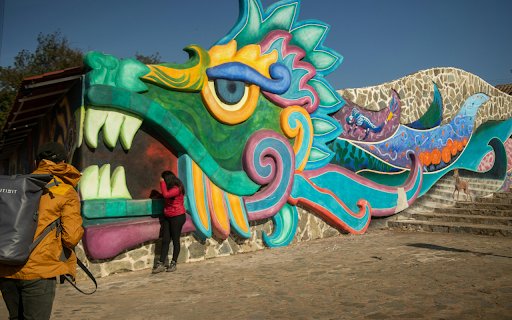 People Standing Beside Multicolored Wall Painting  from Chrome web store to be run with OffiDocs Chromium online
