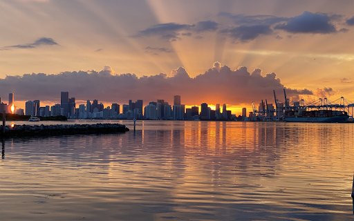 Riverfront buildings and sunset  from Chrome web store to be run with OffiDocs Chromium online