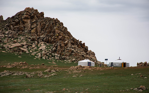 Rocky mountains and large tents  from Chrome web store to be run with OffiDocs Chromium online