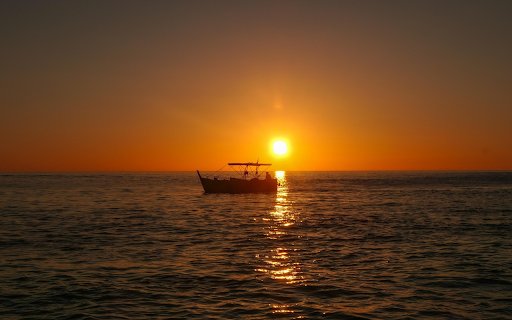 Small boat and sunset  from Chrome web store to be run with OffiDocs Chromium online