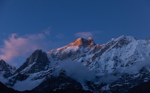 Sunrise on Snowy Peaks  from Chrome web store to be run with OffiDocs Chromium online