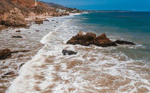 Waves crashing on rocks  from Chrome web store to be run with OffiDocs Chromium online