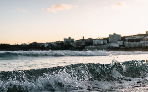 Waves roll onto the shore  from Chrome web store to be run with OffiDocs Chromium online